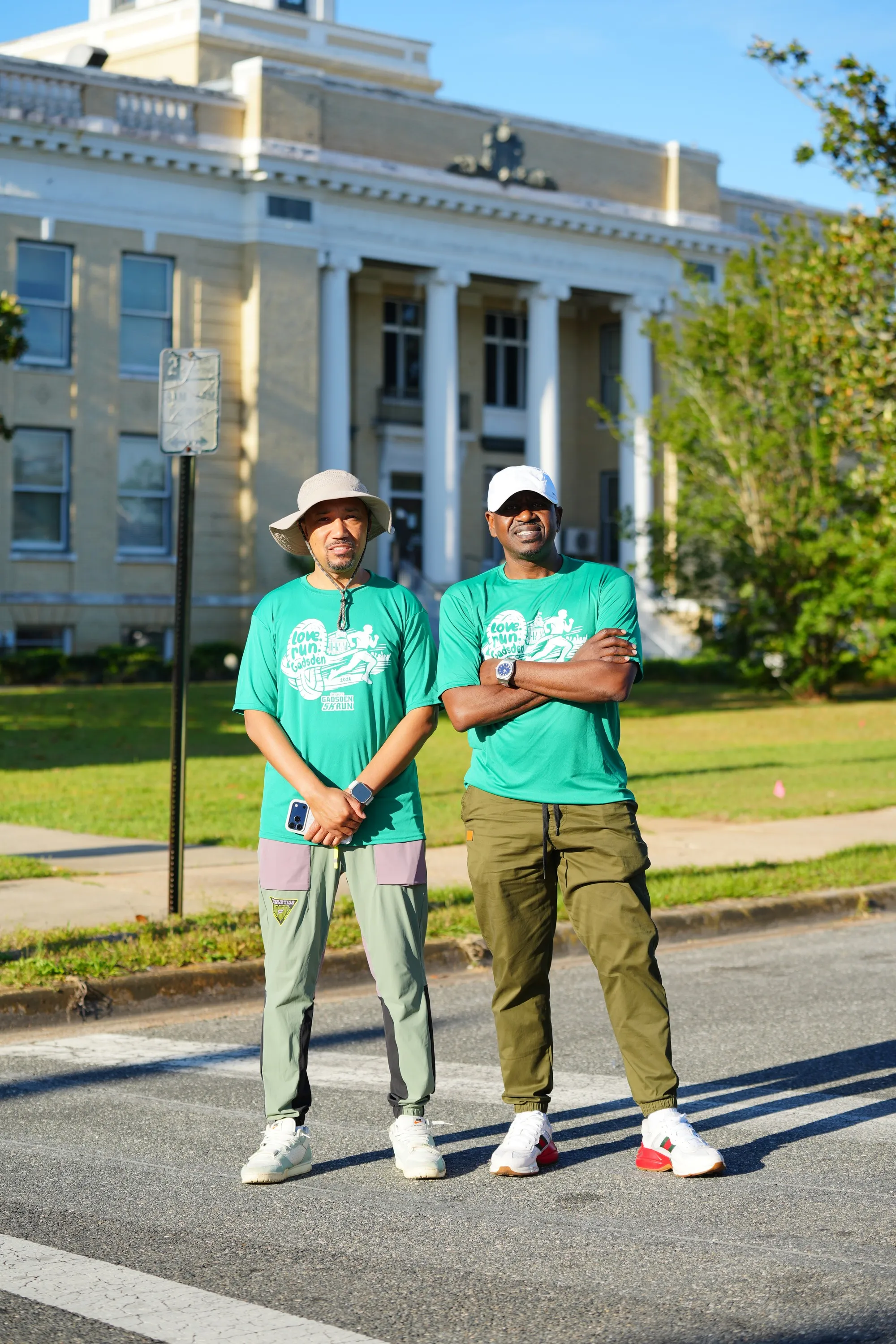 Attorneys Charles Gee and Adaryll Lee standing in front of the historic Gadsden County courthouse